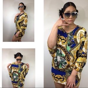 Royal blue and gold winged dress